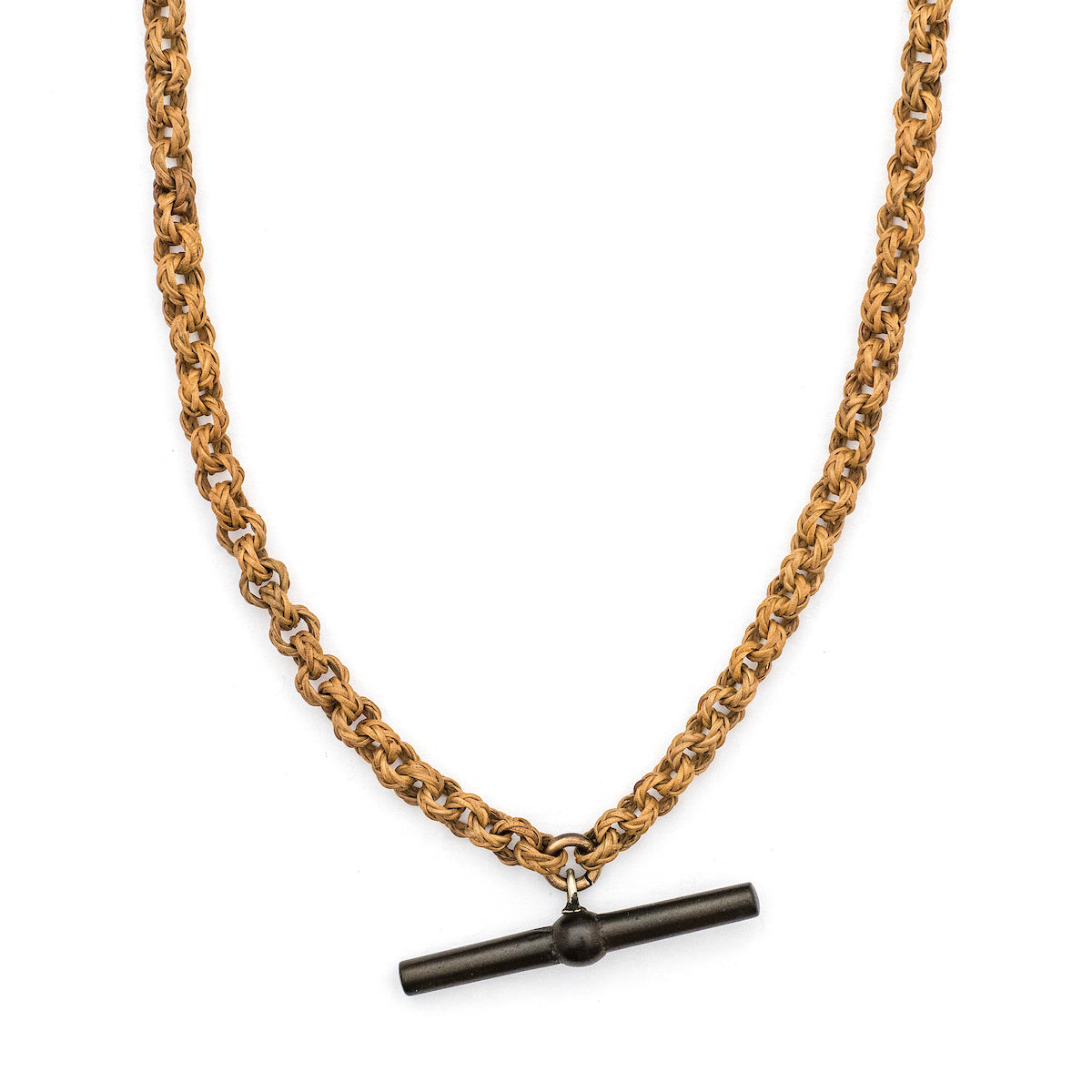 This unusual watch chain is made of finely woven rattan links creating a three dimensional cable style chain, complete with a T bar and hook clasp. Measuring at a very wearable 24" long, you can wear this chain layered with other pieces or alone paired with one of our antique gold fill lockets or charms. Close up chain view, showing t bar