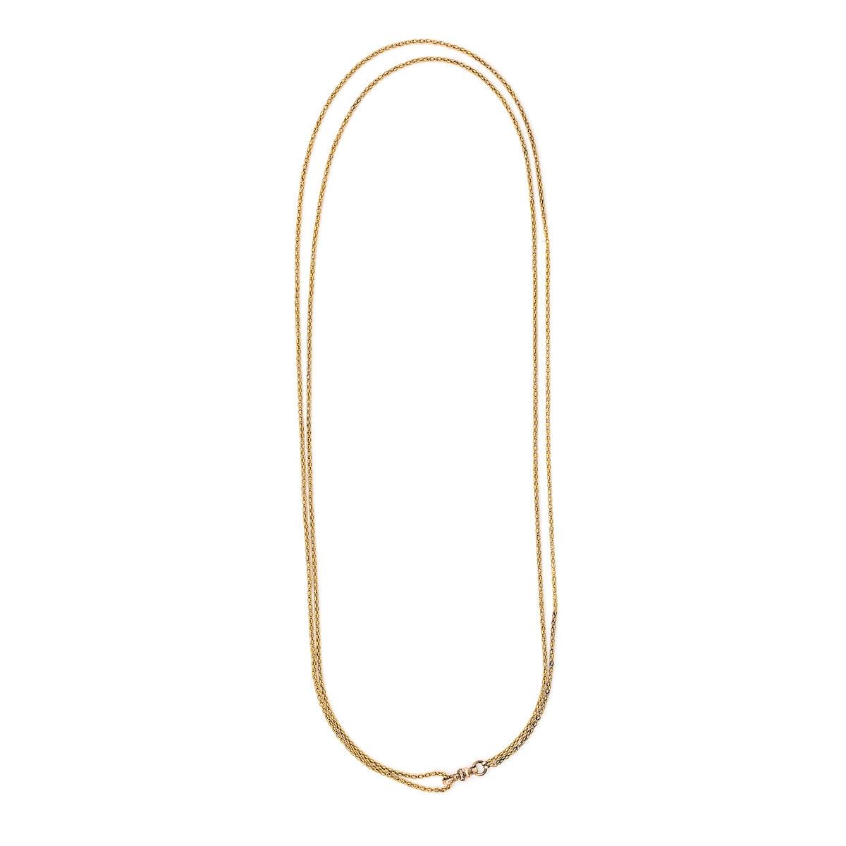 This luxurious gold fill antique watch chain features a three dimensional mesh weave and swivel watch chain clasp. Measuring an impressive 56" long (or a more manageable doubled length of 28"), you can wear this chain layered with other pieces, paired with one of our antique gold fill lockets or simply on its own, a true staple for any jewelry collection! Full chain view