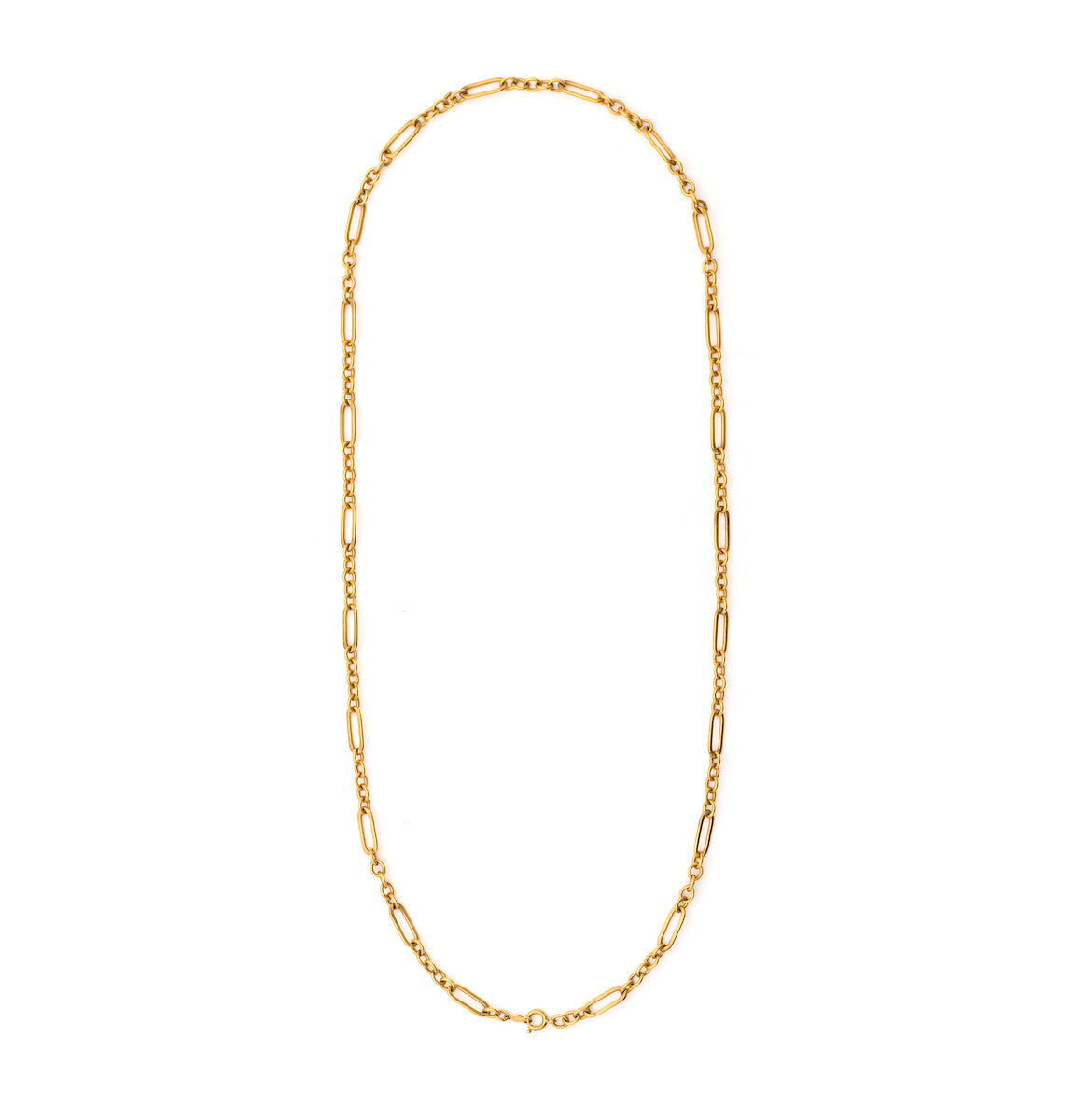 This 12K gold fill vintage chain features prominent links in the long and short style. Measuring 24" long, you can wear this chain layered with other pieces, paired with one of our antique gold fill lockets or simply on its own. Close up chain view