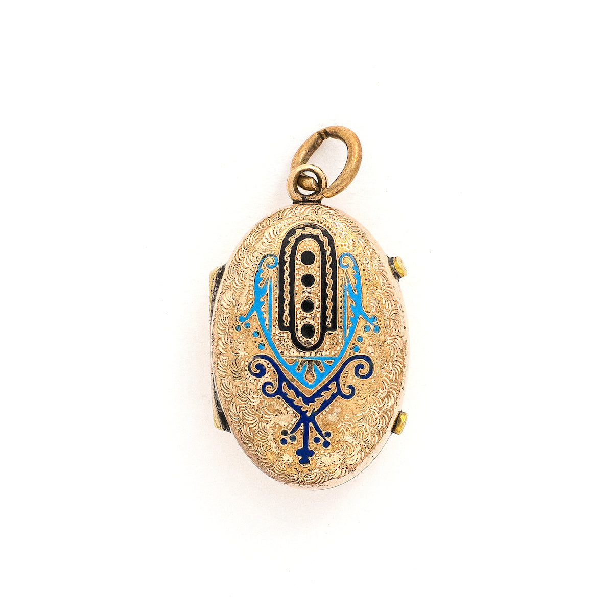 This unique oval locket features a delicate design with sky, navy blue and black enamel set on a finely textured background. The background features floral accents and a cross bar in the same instricate style. It opens to hold two photos, includes both original frames and glass and pairs perfectly with one of our antique gold fill chains. Front locket view  