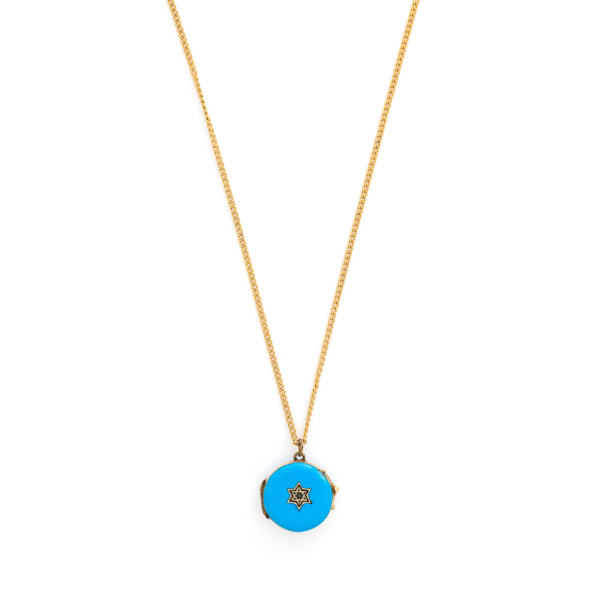 This petite round locket features striking cerulean blue enamel with a 14K gold Star of David at its center and a matching 14K gold border. It opens to hold two photos, includes one original glass and pairs perfectly with one of our antique gold chains. Front locket view, shown on chain