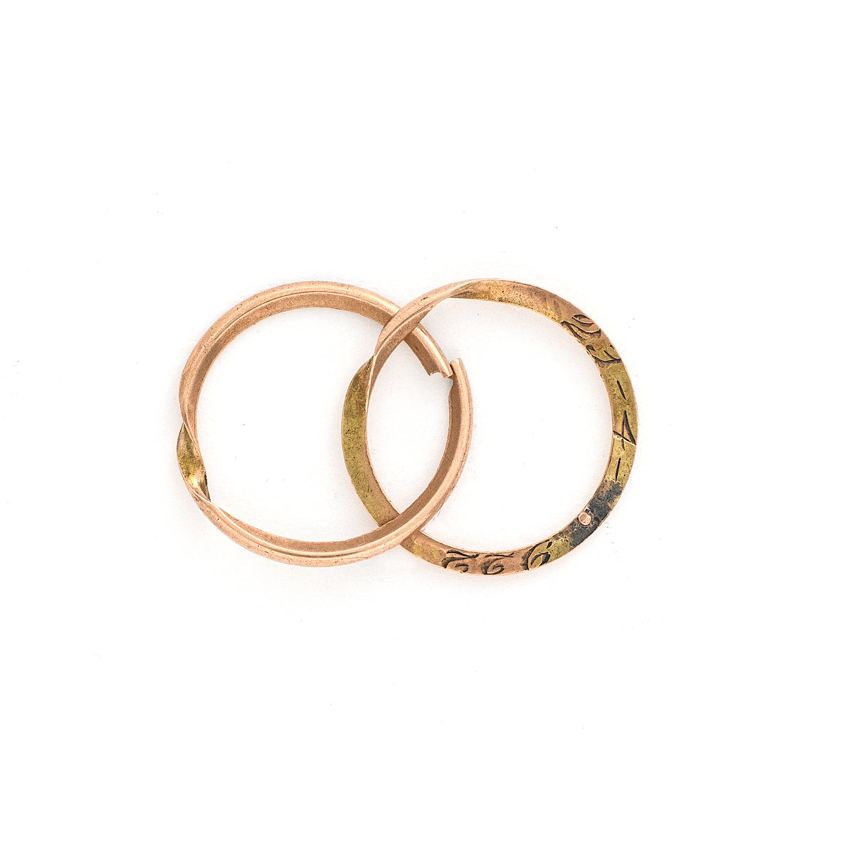 This rare 9K gold split ring breaks apart to reveal a secret message from the past inside. It can be worn as a ring, or is ideal to hang a group of charms or fobs from. The names "Gaetana" and "Vito" and the date "23-4-1922" are lovingly inscribed inside. A unique treasure for any collection! Open ring view