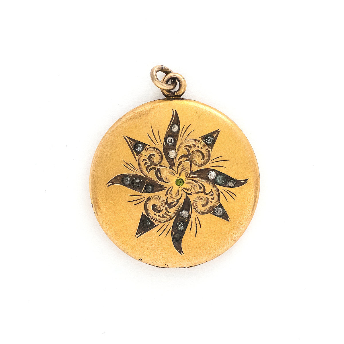 This matte round locket features a playful pinwheel design with white and grey glass stones scattered throughout. The initials CAI are inscribed on the back, it opens to hold two photos, includes both original frames and pairs perfectly with one of our antique gold fill chains. Front locket view
