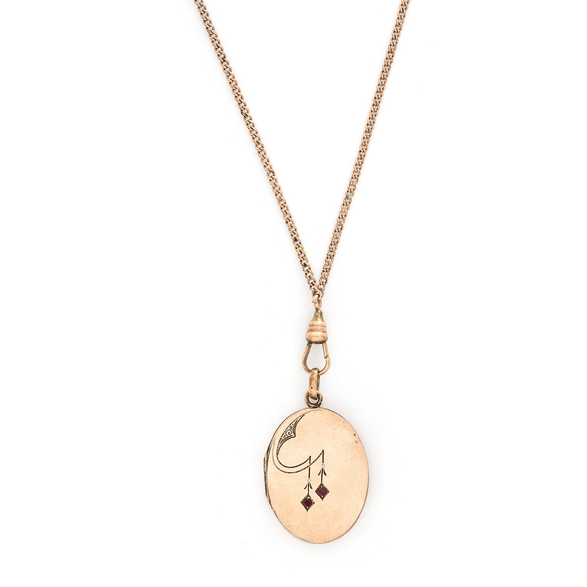This oval locket features a simple Art Deco design with two red floral vines hanging down the center. It opens to hold two photos, includes both original frames and pairs perfectly with one of our antique gold fill chains. Front locket view with chain