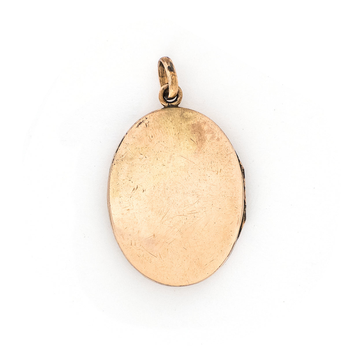 This oval locket features a simple Art Deco design with two red floral vines hanging down the center. It opens to hold two photos, includes both original frames and pairs perfectly with one of our antique gold fill chains. Back locket view
