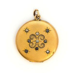 Stars in the Sky Antique Locket, gold fill locket with paste stones and starburst details. Perfect for holding pictures and photos. Front View