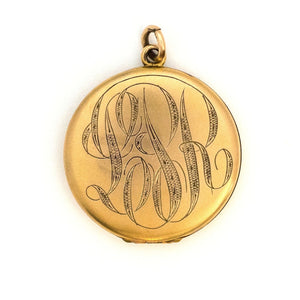 tars in the Sky Antique Locket, gold fill locket with paste stones and starburst details. Perfect for holding pictures and photos. Back of locket view of initial monogram L P R