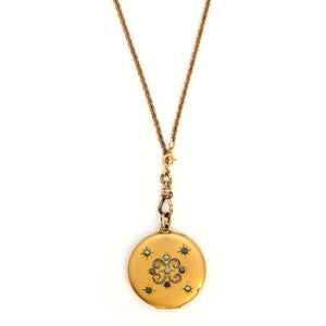 tars in the Sky Antique Locket, gold fill locket with paste stones and starburst details. Perfect for holding pictures and photos. Front View shown on antique gold fill watch chain