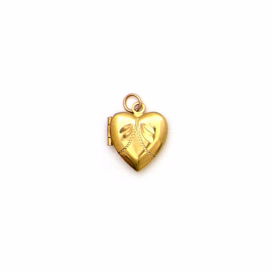 Tiny Winged Heart Locket