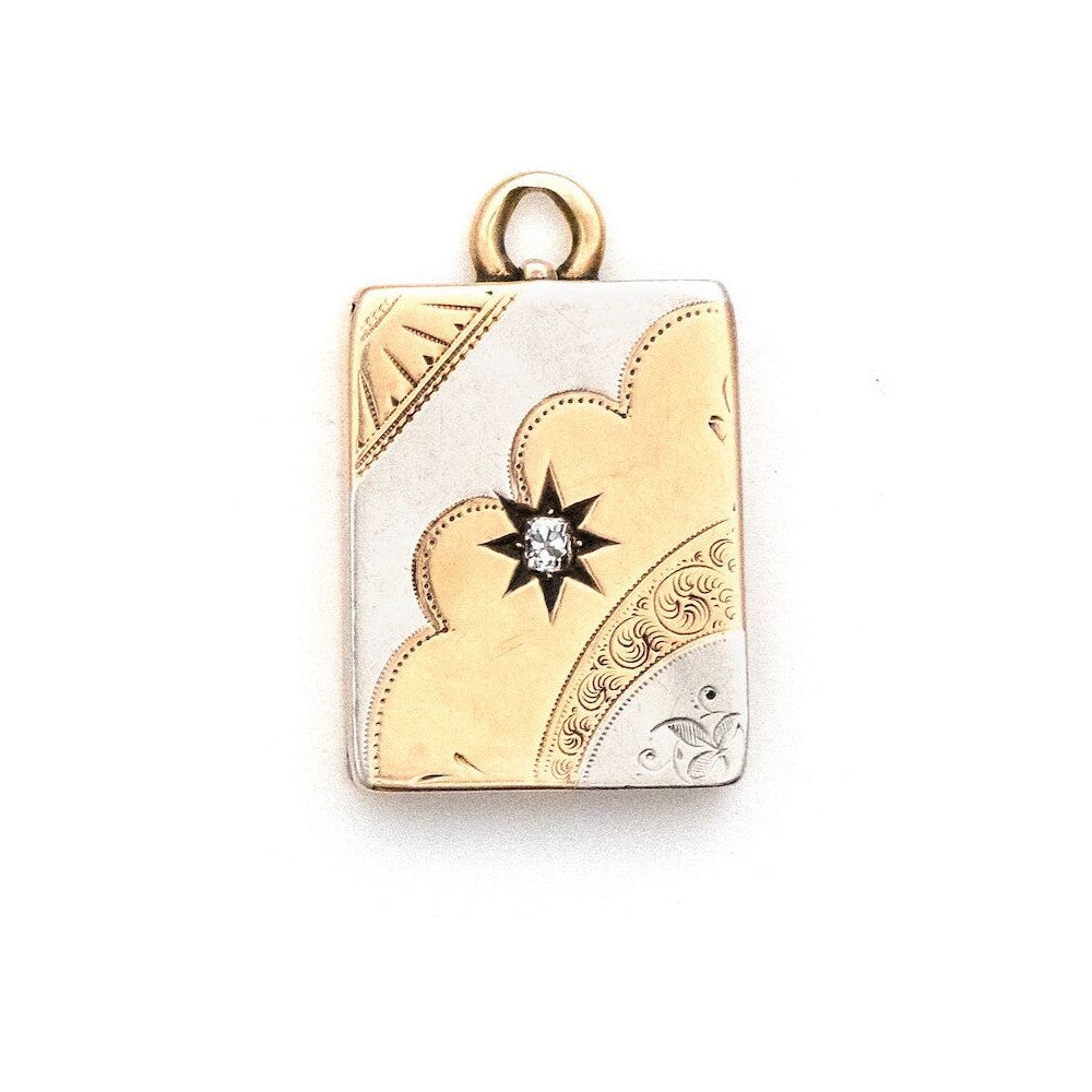 14K Rose Gold & Platinum Rectangular Art Deco Antique Locket with diamond in the middle, holds pictures and photos, front view