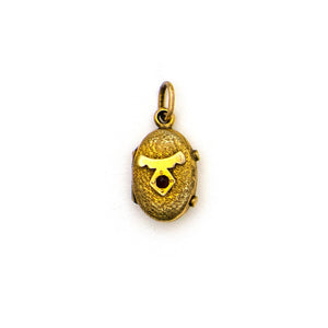 Tiny Oval Garnet Locket
