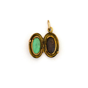 Tiny Oval Garnet Locket