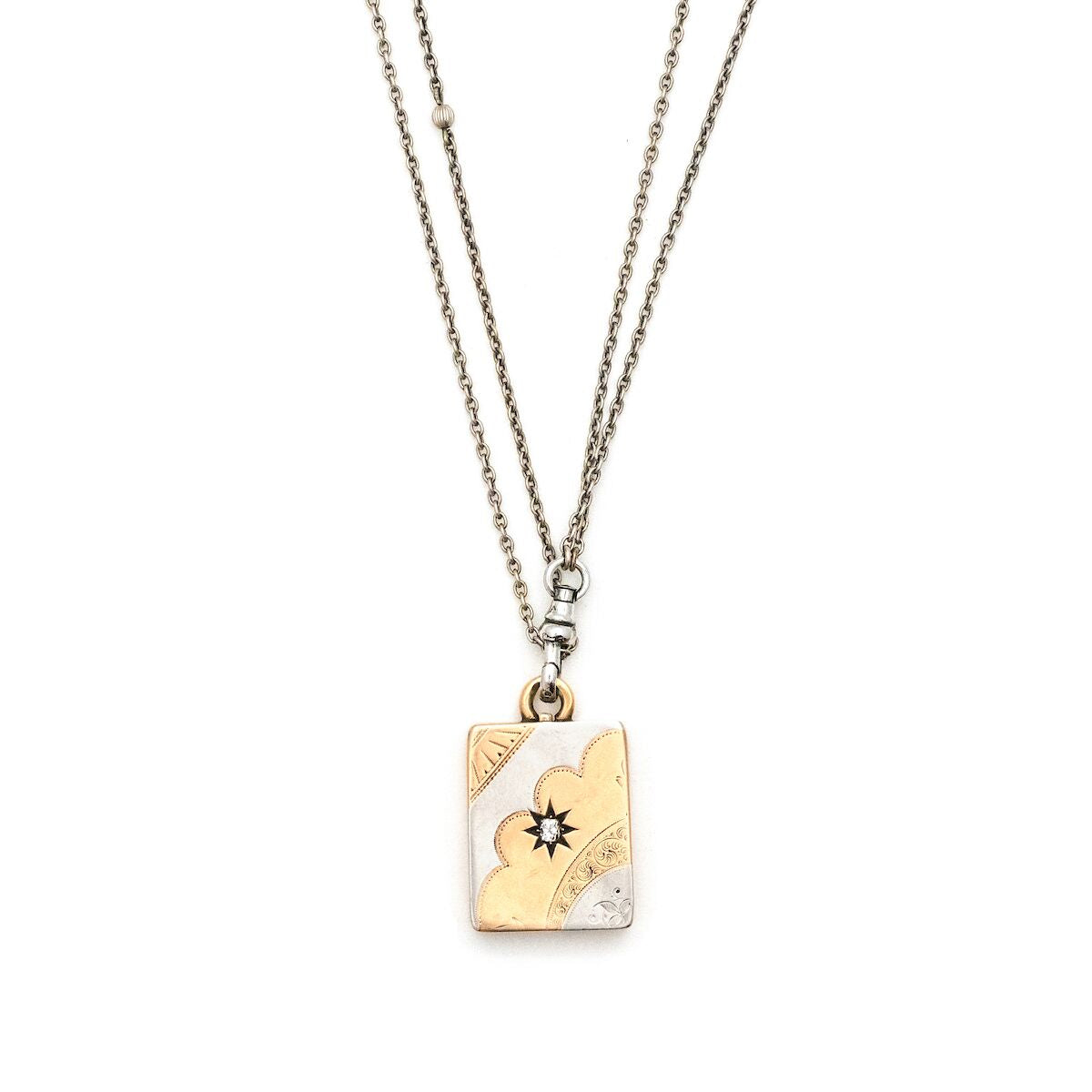14K Rose Gold & Platinum Rectangular Art Deco Antique Locket with diamond in the middle, holds pictures and photos, front view, shown on sterling silver vintage watch chain