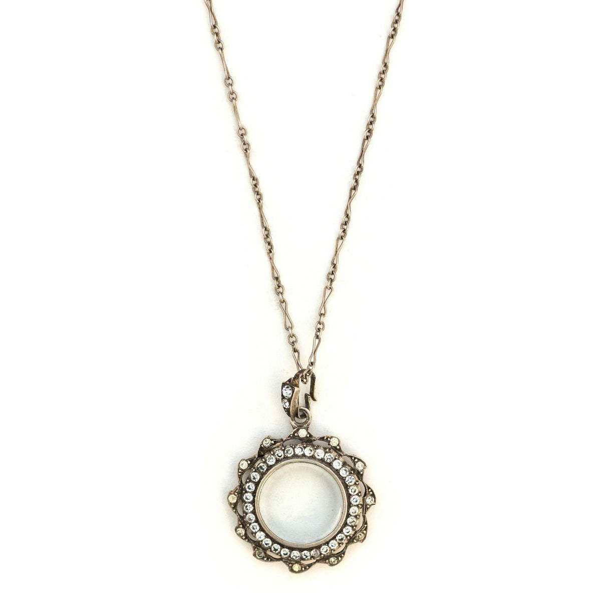 Sterling French Paste Antique Halo Locket, clear locket, perfect for photos and pictures, front view shown on antique sterling silver fancy link chain