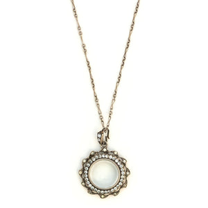 Sterling French Paste Antique Halo Locket, clear locket, perfect for photos and pictures, front view shown on antique sterling silver fancy link chain